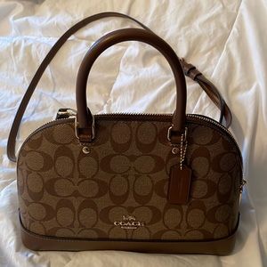 Coach cross body style handbag. Used once. Excellent Condition.